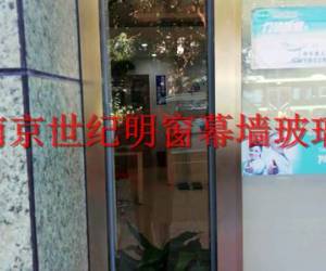 龍蟠路505號眼鏡店幕墻玻璃門維修更換